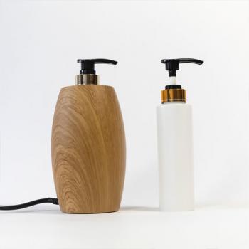 Massage oil warmer Grazia with pump bottle